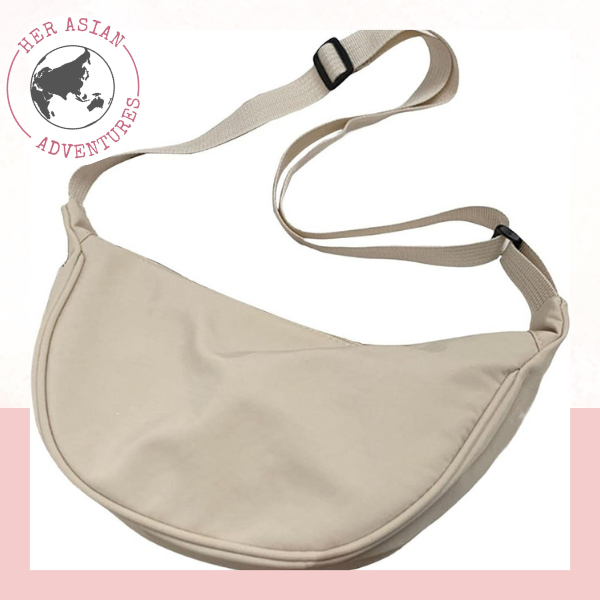 Her Asian Adventures. Travel safety items for solo female travelers. Uniqlo bumbag. Travel safety items. Safety items for solo female travelers. Solo travel safety items. travel safety products. 