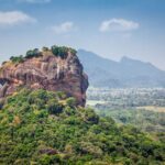 Sigiriya Rock rising above the jungle, a major reason why Sri Lanka is worth visiting for its historical significance and breathtaking views