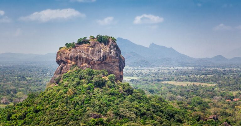 Sigiriya Rock rising above the jungle, a major reason why Sri Lanka is worth visiting for its historical significance and breathtaking views