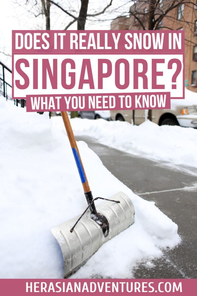 A metal snow shovel leaning against a pile of snow on a sidewalk, with text overlay reading, "Does It Really Snow in Singapore? What You Need to Know." Highlights the curiosity about snow and winter weather in Singapore.