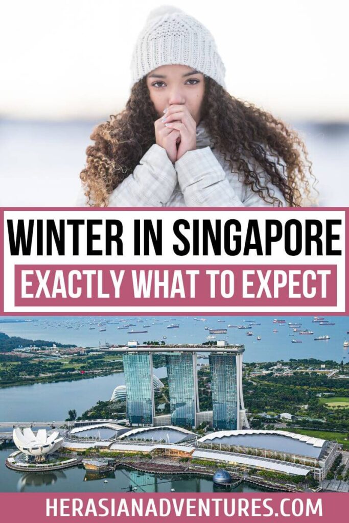 A woman dressed in a knit hat and coat stands outdoors, exhaling in the cold, with the Marina Bay Sands skyline below. Text overlay reads, "Winter in Singapore: Exactly What to Expect." Captures Singapore's winter travel expectations and landmarks.