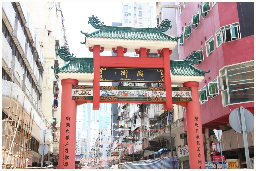 The entrance gate to Temple Street in Hong Kong. Flying time to Singapore from various Asian cities is relatively short.