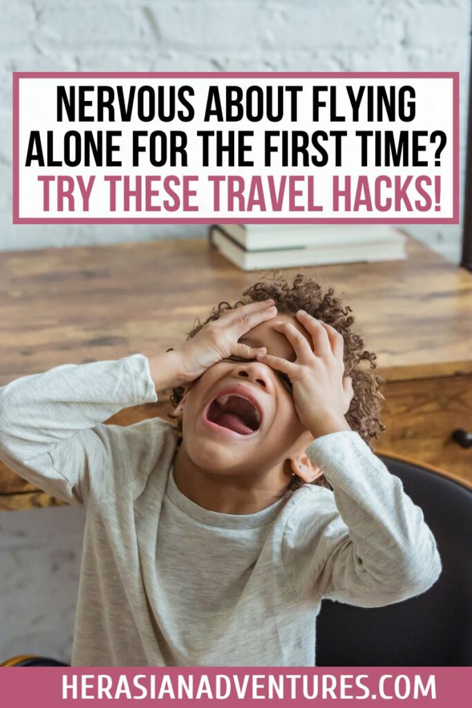 oung child covering their eyes in frustration beneath text: "Nervous About Flying Alone For The First Time? Try These Travel Hacks!" A helpful guide offering anxiety tips for first time solo flyers and how to stay calm when flying for the first time.