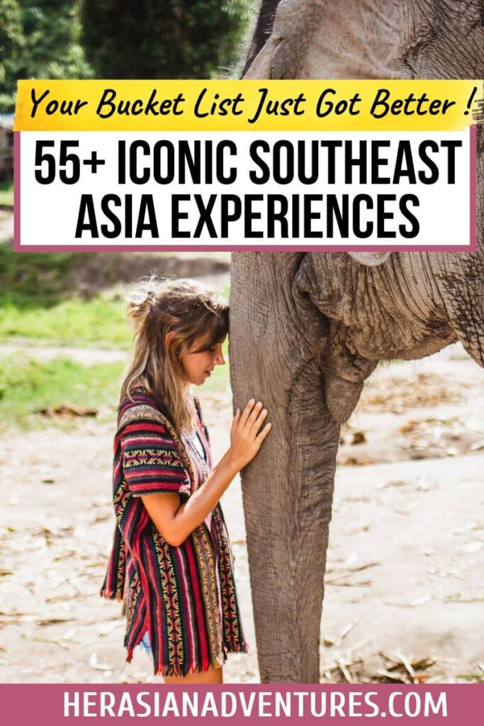 A woman in a colorful poncho rests her head gently against an elephant in a serene natural setting. Text overlay says "55+ Iconic Southeast Asia Experiences," symbolizing unforgettable bucket list Southeast Asia adventures.