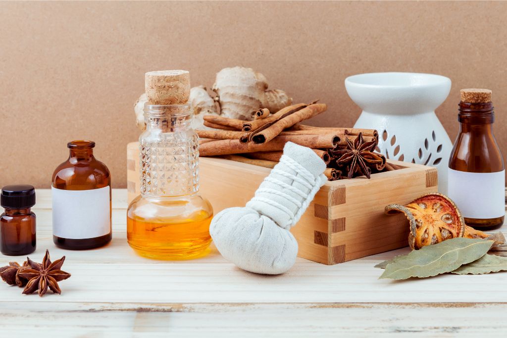 A collection of Ayurvedic herbs, oils, and spices displayed on a wooden table, representing Sri Lanka’s traditional wellness products. These items are popular souvenirs from Sri Lanka, perfect for natural healing enthusiasts.