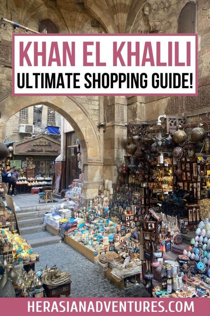 Image with text “Khan El Khalili Ultimate Shopping Guide!”: An arched entryway leading to a crowded Khan el Khalili bazaar, filled with lanterns, ceramics, and intricate handcrafts, reflecting the rich Egyptian marketplace aesthetic.