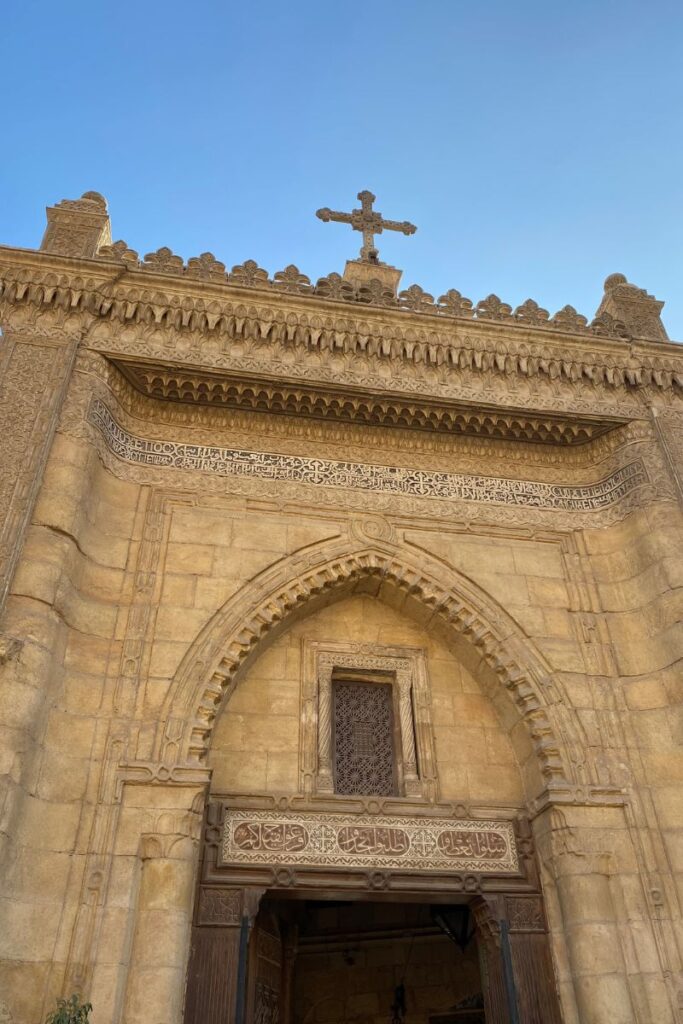 The ornate facade of St. George’s Church in Coptic Cairo, showcasing intricate Christian architecture and its role as a key landmark in Egypt's religious history and Christian pilgrimage.