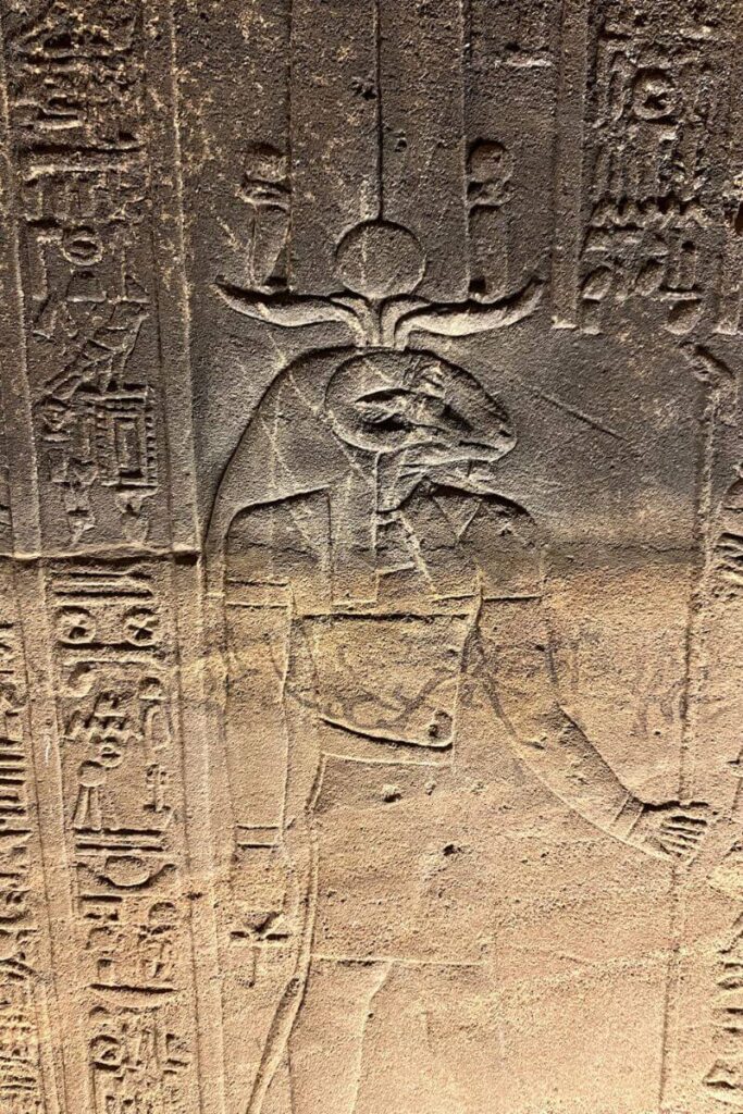 Engraving of the falcon-headed god Horus on the walls of the Temple of Isis Egypt, showcasing ancient relief work in the Temple of Philae on Philae Island.