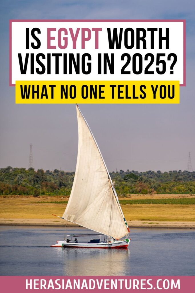 A traditional felucca boat sails peacefully on the Nile River with sand dunes and lush greenery in the background. The image features a text overlay that reads “5 Incredible Reasons Egypt’s Worth a Visit,” making it a visual standout for answering is Egypt worth visiting, highlighting reasons to visit Egypt, and inspiring travelers on why to visit Egypt.