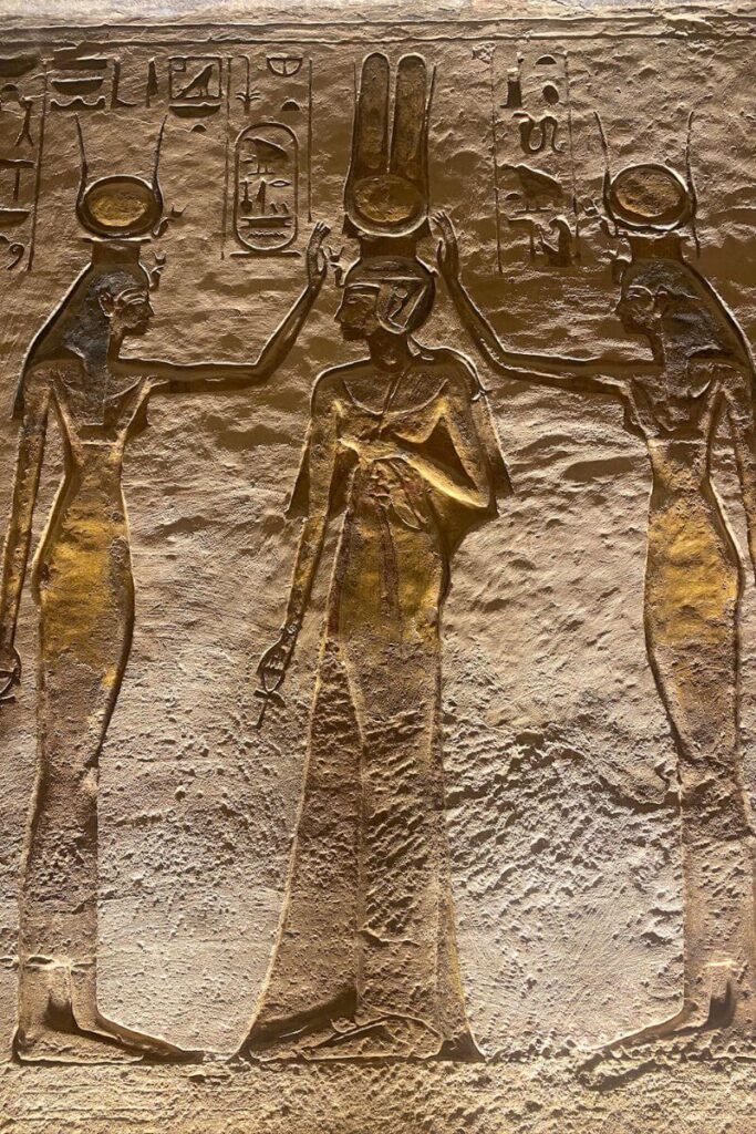 Close-up of a hieroglyphic wall depicting Egyptian goddesses, highlighting the artistry preserved during the relocation of the Abu Simbel temples—essential Abu Simbel facts for history lovers.
