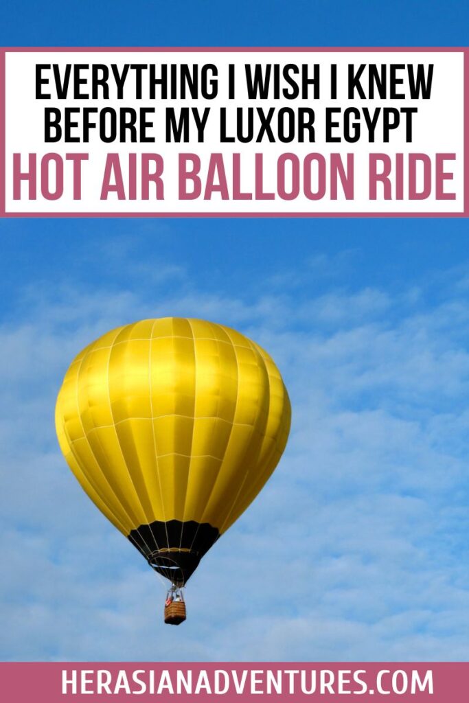 A single bright yellow hot air balloon soars high against a blue sky, with visible text reading: "Everything I Wish I Knew Before My Luxor Egypt Hot Air Balloon Ride". This image emphasizes helpful insights into planning a hot air balloon ride in Luxor.