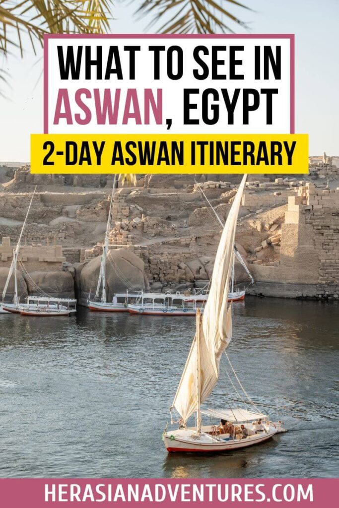 A traditional sailboat glides along the Nile River past ancient ruins in Aswan, Egypt, with text overlay saying “What to See in Aswan, Egypt – 2-Day Aswan Itinerary.” A scenic introduction to top things to do in Aswan in 2 days, and whether Aswan is worth visiting.