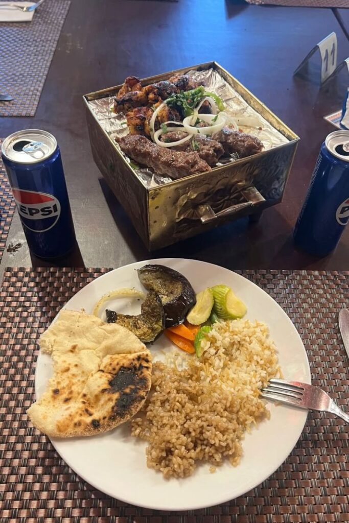 Table with traditional Egyptian meal and drinks — tipping in restaurants is part of everyday life in Egypt. Learn Egypt tipping etiquette and cost of living insights for travelers.