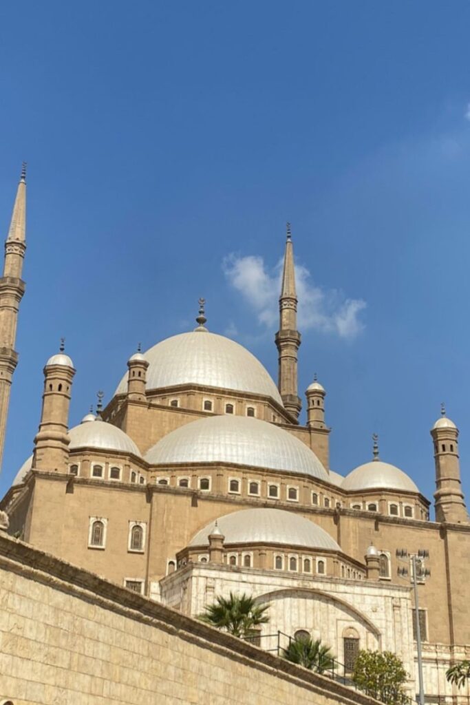 The grand domes and minarets of the Mosque of Muhammad Ali in Cairo, representing the evolution of architecture of Egypt and often mistaken for a temple of Cairo.