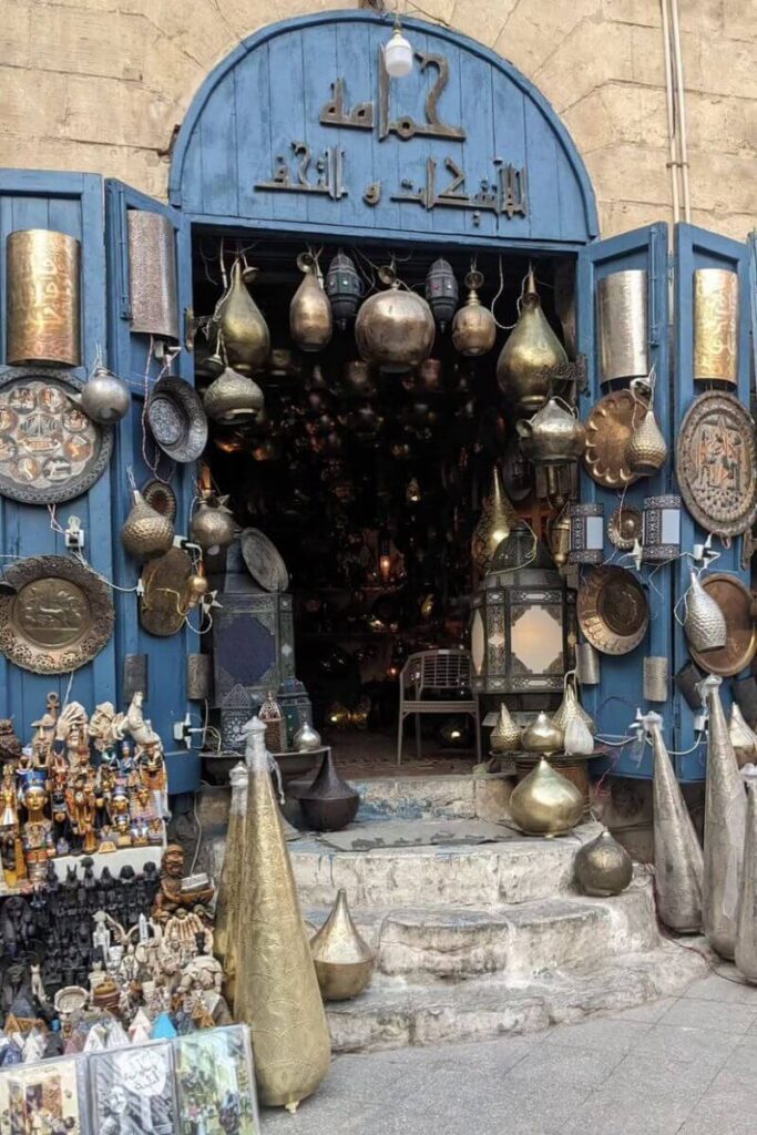 Traditional Egyptian brass shop with souvenirs and lamps — Egypt tipping culture includes tipping in markets and small shops. Get Egypt travel tips for navigating shopping etiquette.