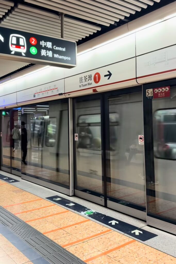 A busy MTR platform with signs for Central and Whampoa highlights the efficiency of Hong Kong’s public transport. Easy metro access makes staying in central Hong Kong ideal for first-time visitors, budget travelers, or those looking for the best area to stay in Hong Kong for 2 nights or more.