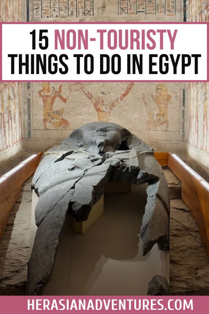 Broken black stone sarcophagus lies in a tomb chamber adorned with ancient Egyptian wall paintings, overlaid with the text “15 Non-Touristy Things to Do in Egypt.” This visual promotes rare and meaningful experiences that go beyond crowded attractions, highlighting unique experiences in Egypt for curious travelers. Ideal for anyone building an Egypt bucket list filled with immersive, authentic, and non touristy things to do in Egypt that most visitors overlook.