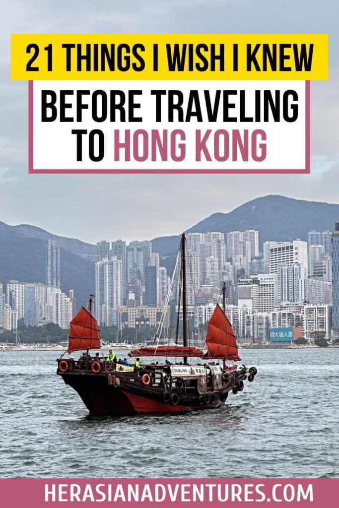 A red-sailed junk boat on Victoria Harbour with text overlay reading “21 Things I Wish I Knew Before Traveling to Hong Kong.” Highlights useful tourist tips and travel advice for Hong Kong.