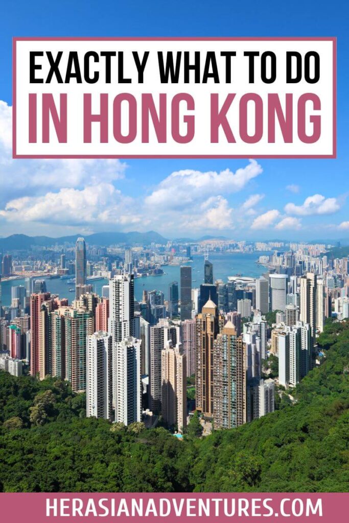 A stunning panoramic view from Victoria Peak captures Hong Kong Island’s skyline and Victoria Harbour under a bright blue sky, with bold text overlay reading “Exactly What to Do in Hong Kong.” This visual guide highlights what to see in Hong Kong and features one of the city’s most iconic viewpoints.