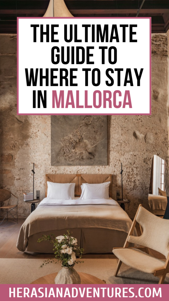 A sophisticated stone-walled hotel room with natural textures and text reading “The Ultimate Guide To Where To Stay In Mallorca.” Ideal for readers planning where to stay in Mallorca for first time visits or romantic getaways.